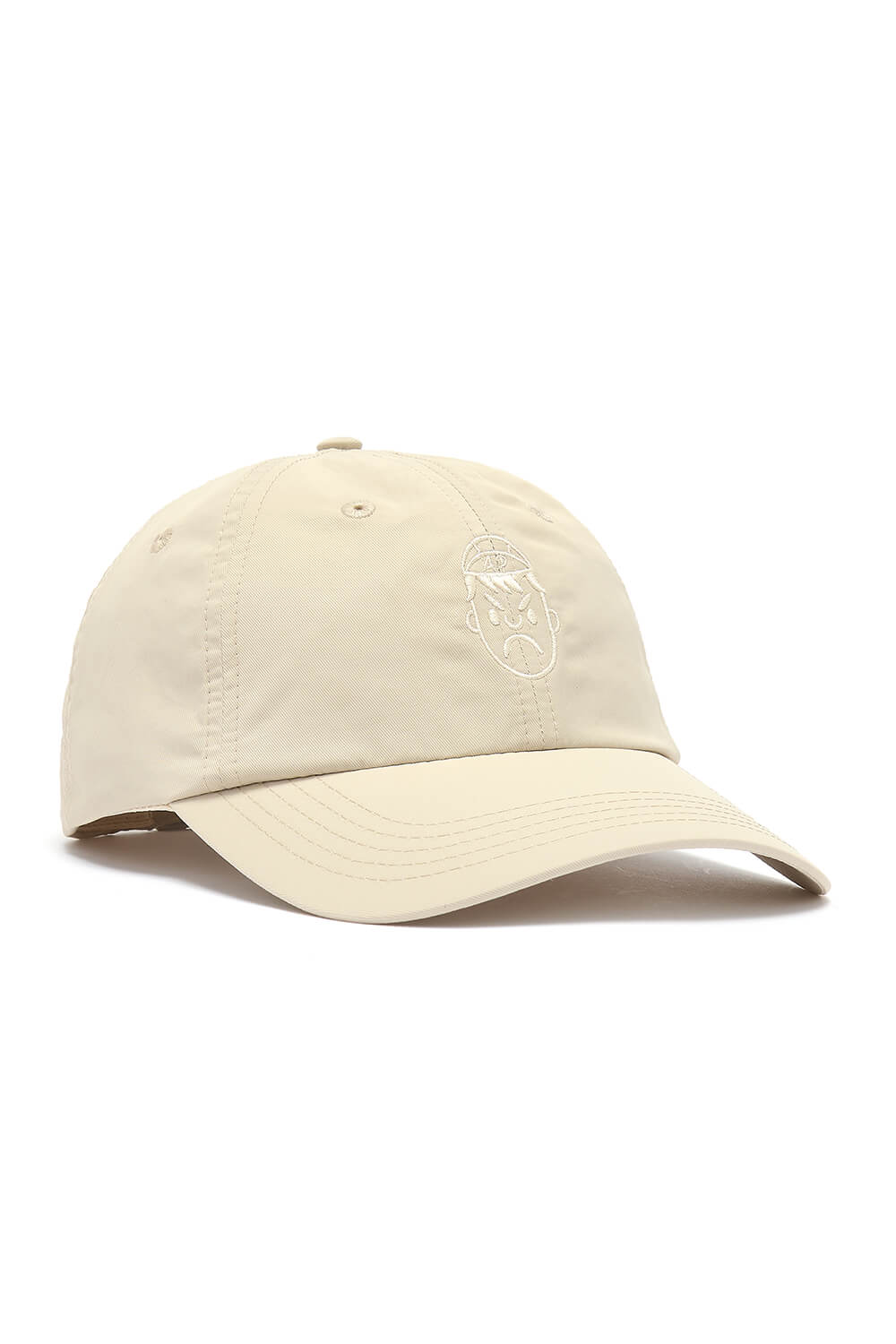 A cream coloured cap made from water resistant performance fabrics.